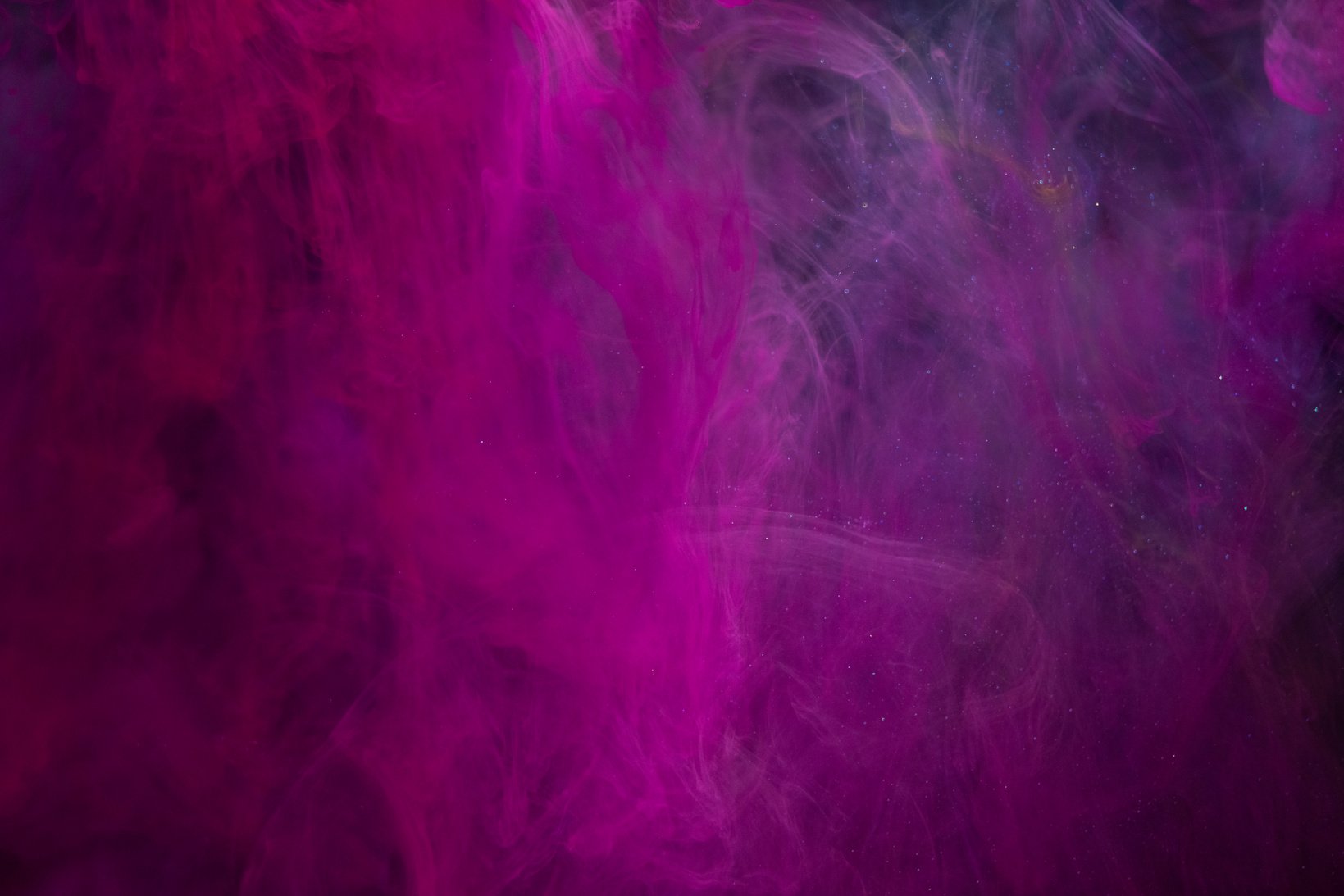 Purple Smoke on Black Background